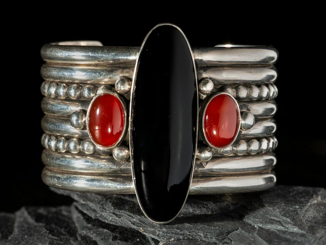 Mike Bird Romero (Ohkay Owingeh, b. 1946)  Sterling Silver, Jet, and Agate Cuff Bracelet (1 of 2)