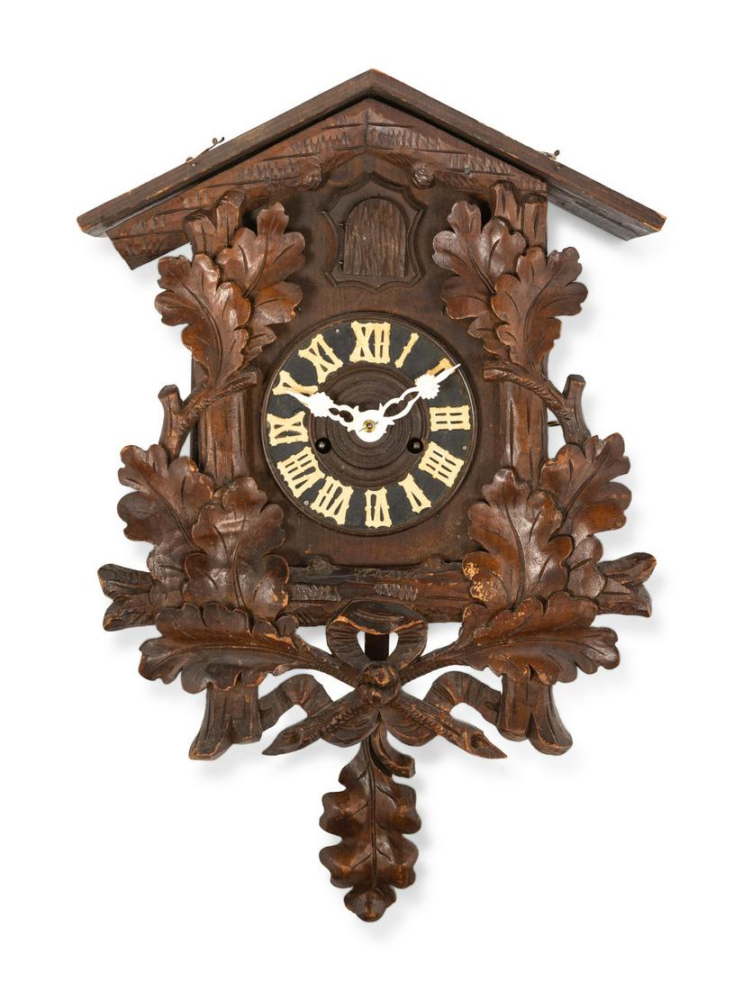A Black Forest Carved Cuckoo Clock (1 of 3)