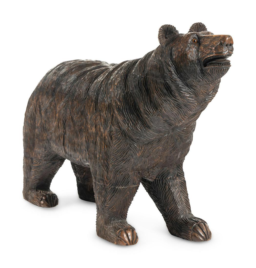 A Swiss Black Forest Carved Walnut Bear (1 of 4)