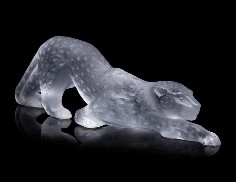 A Lalique Zeila Panther Sculpture: A Lalique Zeila Panther Sculpture 20th Century with Lalique France etched to the underside. Height 4 1/4 x length 14 inches. This lot is located in Chica