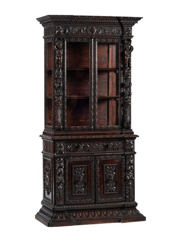 An Italian Renaissance Revival Carved Walnut Bookcase or Vitrine Cabinet: An Italian Renaissance Revival Carved Walnut Bookcase or Vitrine Cabinet Circa 1870 Height 80 x width 40 x depth 17 3/4 inches. This lot is located in Cincinnati. Condition