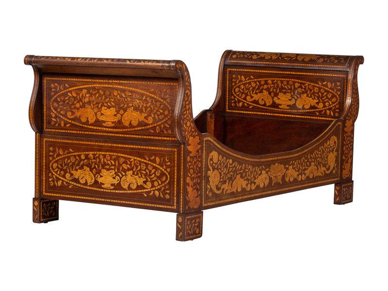 A Dutch Mahogany and Marquetry Sleigh Bed: A Dutch Mahogany and Marquetry Sleigh Bed Late 19th Century Height 40 x length 91 x width 42 inches. This lot is located in Cincinnati. Property from a Private Collectio
