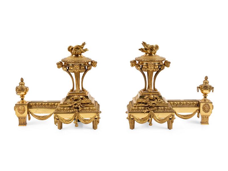 A Pair of French Neoclassical Gilt Bronze Chenets: A Pair of French Neoclassical Gilt Bronze Chenets Circa 1900 Height 13 x width 13 1/2 x depth 7 inches. This lot is located in Chicago. Condition Both in overall fairl