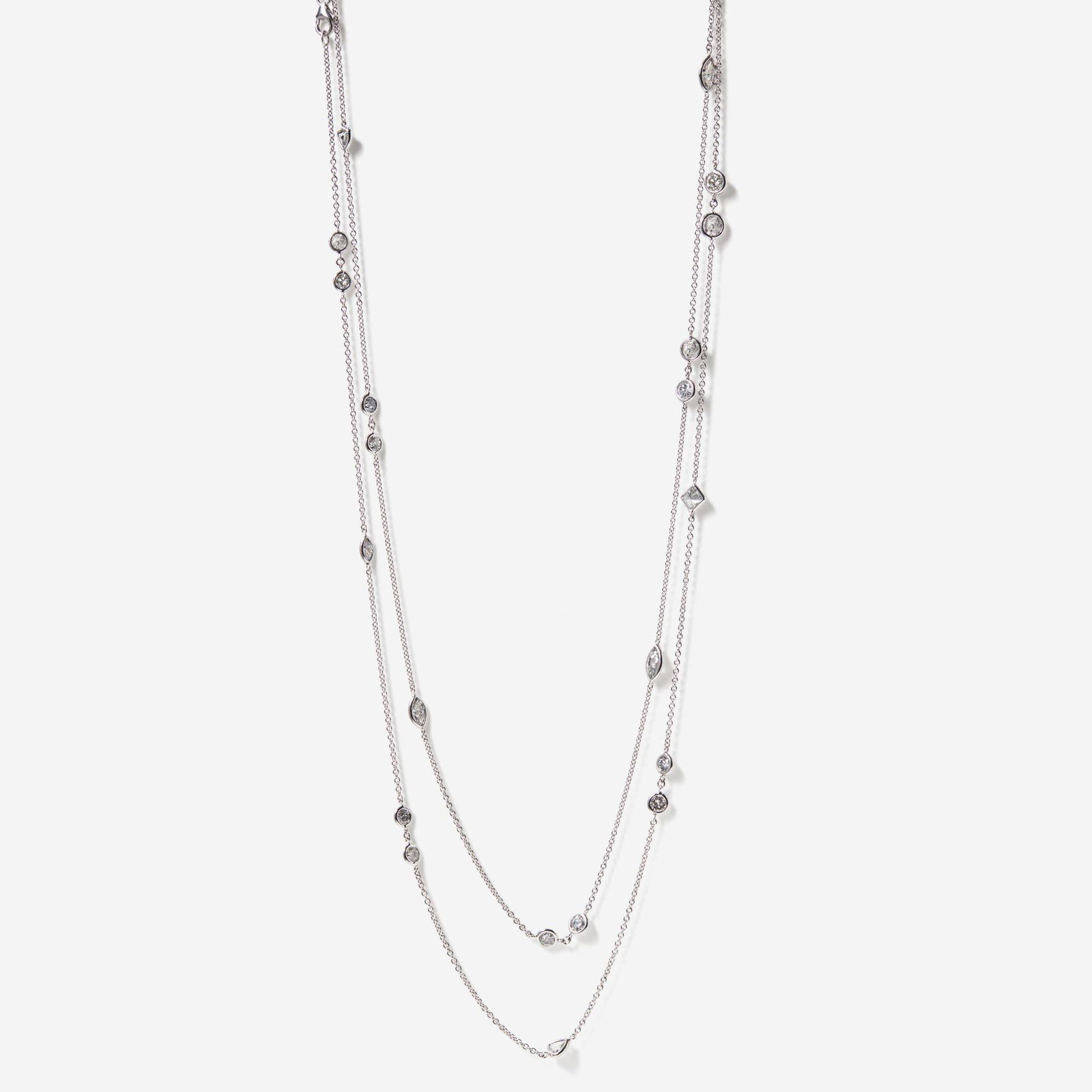 An 18K White Gold and Diamond Station Necklace (1 of 5)