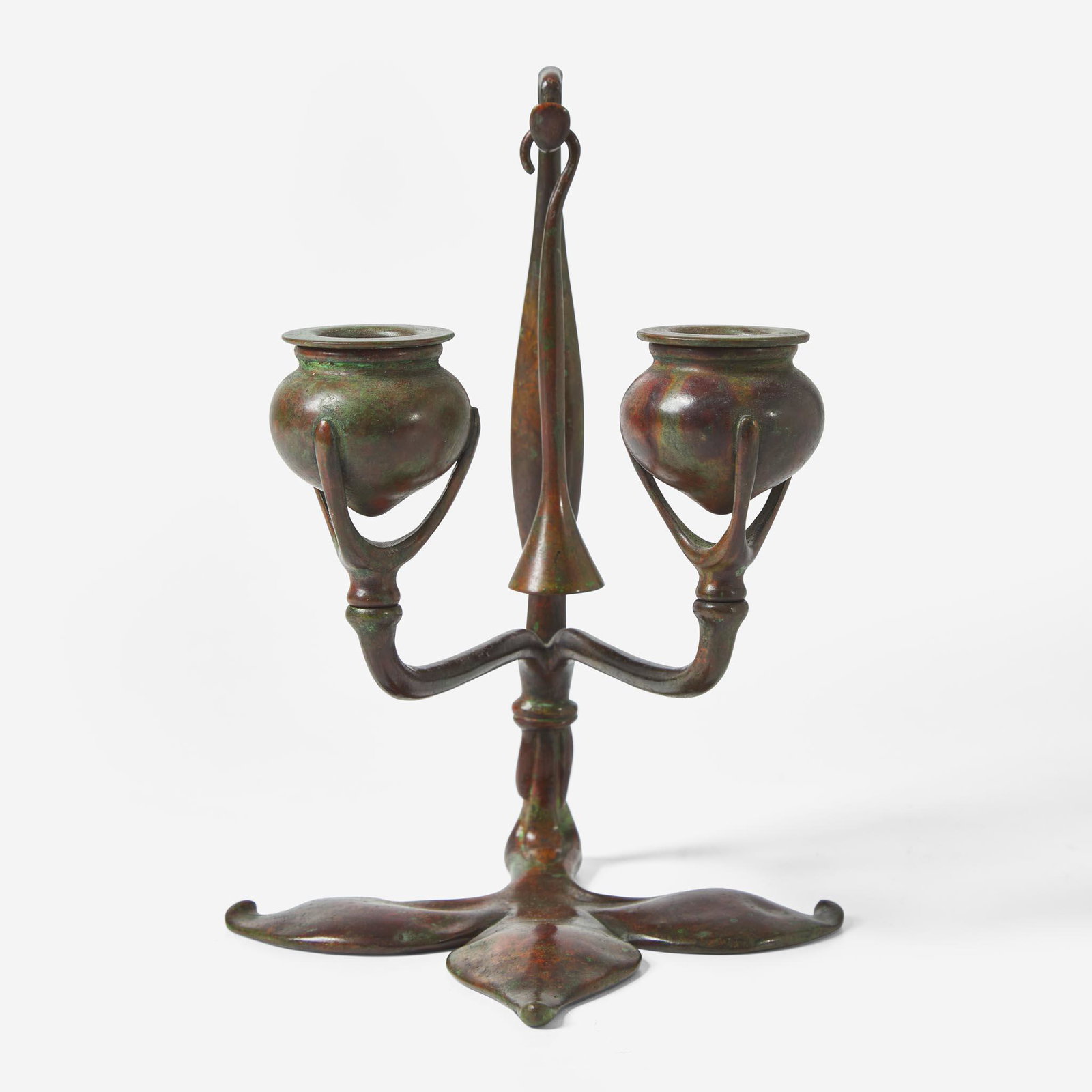 Tiffany Studios (American, active 1878-1932) A Bronze "Fleur de Lis" Two-Light Candelabra with Snuff (1 of 4)