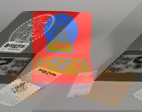 179: An A.C. Gilbert Erector Illumination Kit,: An A.C. Gilbert Erector Illumination Kit, 1950, set number 5, parts organized on original cardboard, instructions and inspector voucher, Very Good+ overall condition.