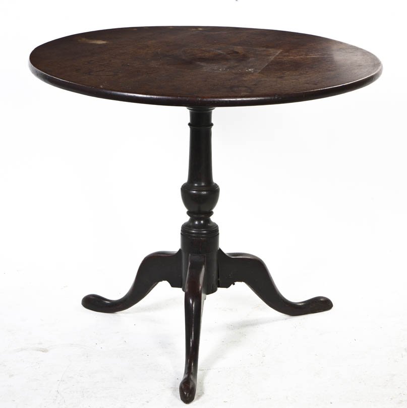 An English Oak Occasional Table, Height 28 x diam: An English Oak Occasional Table, the circular top set on a turned standard, raised on a tripod base. Height 28 x diameter 33 1/4 inches. Property from the Elne Elaine Russ Trust, Winnetka, Illinois