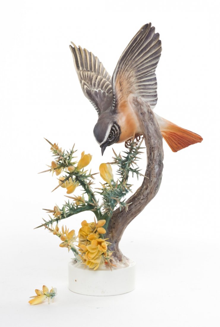 A Royal Worcester Dorothy Doughty Bird, Redstart,: A Royal Worcester Dorothy Doughty Bird, Redstart, perched on gorse. Height 8 inches.