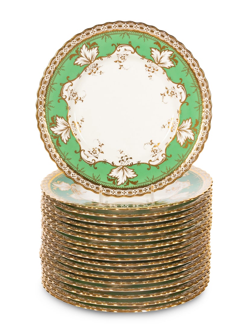 A Set of Eighteen Mintons Parcel Gilt Porcelain Dessert Plates: A Set of Eighteen Mintons Parcel Gilt Porcelain Dessert Plates Retailed by Tatman, Chicago, 20th Century each with puce maker's and retailer's mark to the underside. Diameter 8 7/8 inches. This lot is