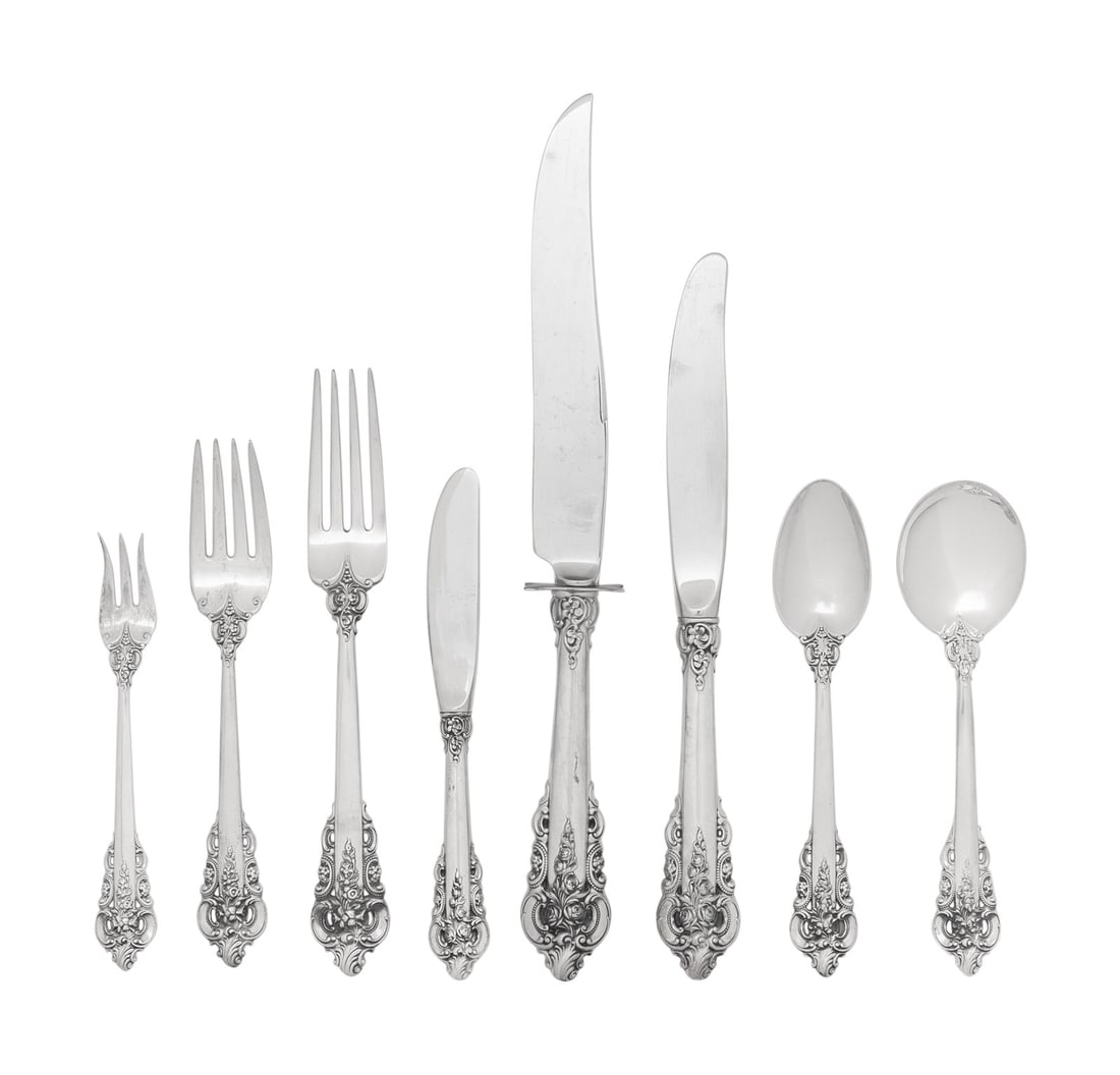 An American Silver Flatware Service: An American Silver Flatware Service Wallace Silversmiths, Wallingford, Connecticut, 20th Century Grand Baroque pattern, comprising: 15 dinner knives 13 forks 13 salad forks 21 teaspoons 13 soup spoons