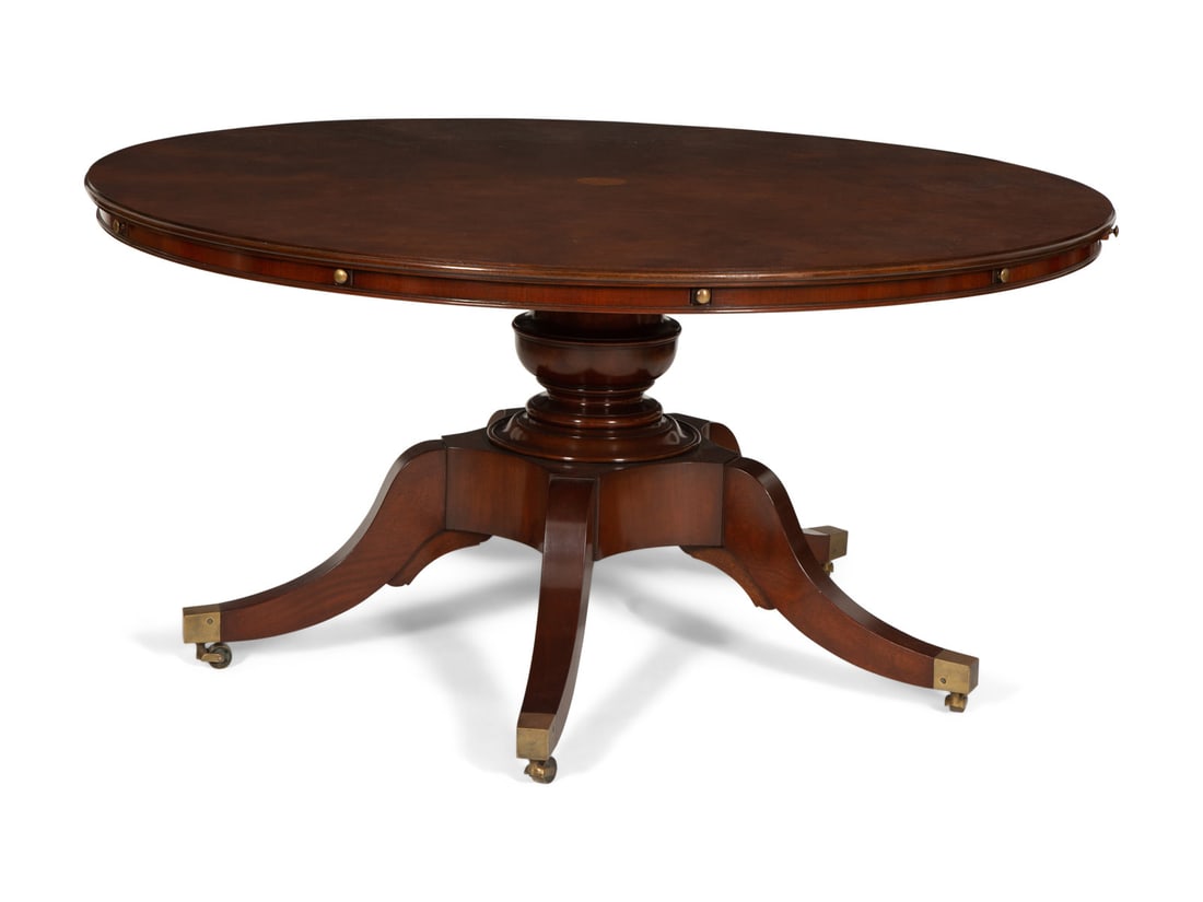 A Regency Style Mahogany Extending  Circular Dining Table on a Five Leg Base (1 of 4)