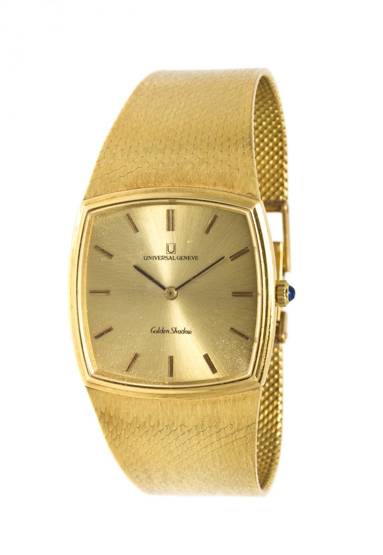 An 18 Karat Yellow Gold Golden Shadow Wristwatch,: An 18 Karat Yellow Gold Golden Shadow Wristwatch, Universal Geneve, 31.00 mm case diameter, matte gilt dial, enameled pencil hands, snap on case back, textured mesh link bracelet, box clasp. Case back