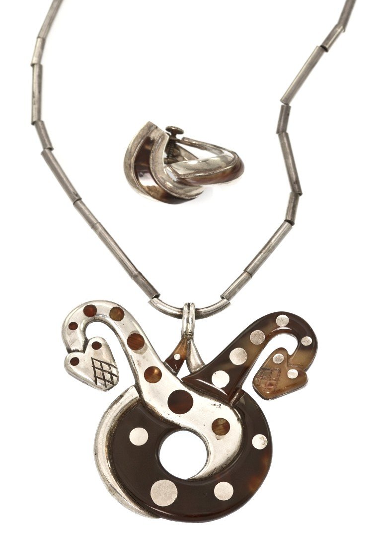 A Sterling Silver and Tortoiseshell Necklace, Will: A Sterling Silver and Tortoiseshell Necklace, William Spratling, consisting of a double snake motif pendant accented with carved tortoiseshell sections, suspended from a cylindrical link chain, togeth