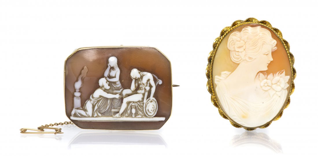 A Group of Shell Cameo Jewelry,: A Group of Shell Cameo Jewelry, consisting of an octagonal cameo depicting a Classical scene within a nine karat gold bezel setting, together with an oval cameo depicting a female bust in profile with