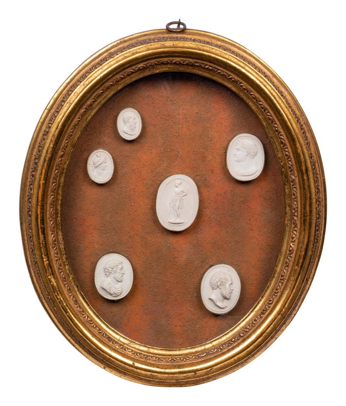 A Group of Six Grand Tour Plaster Intaglios: A Group of Six Grand Tour Plaster Intaglios 19th Century Frame: 13 x 11 inches. This lot is located in Chicago. Condition Largest intaglio (at center): 2 x 1 3/8