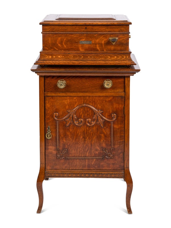 A Regina Coin Operated 15 1/2 Inch Disc Music Box and Stand (1 of 5)