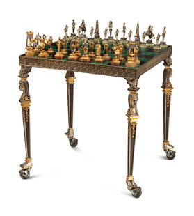 An Italian Gilt and Silvered Bronze Chess Set and Table: An Italian Gilt and Silvered Bronze Chess Set and Table Giuseppe Vasari, 20th Century the table's top with a malachite and marble playing surface. Height of table 26 x width 26 x depth 26 inches. This