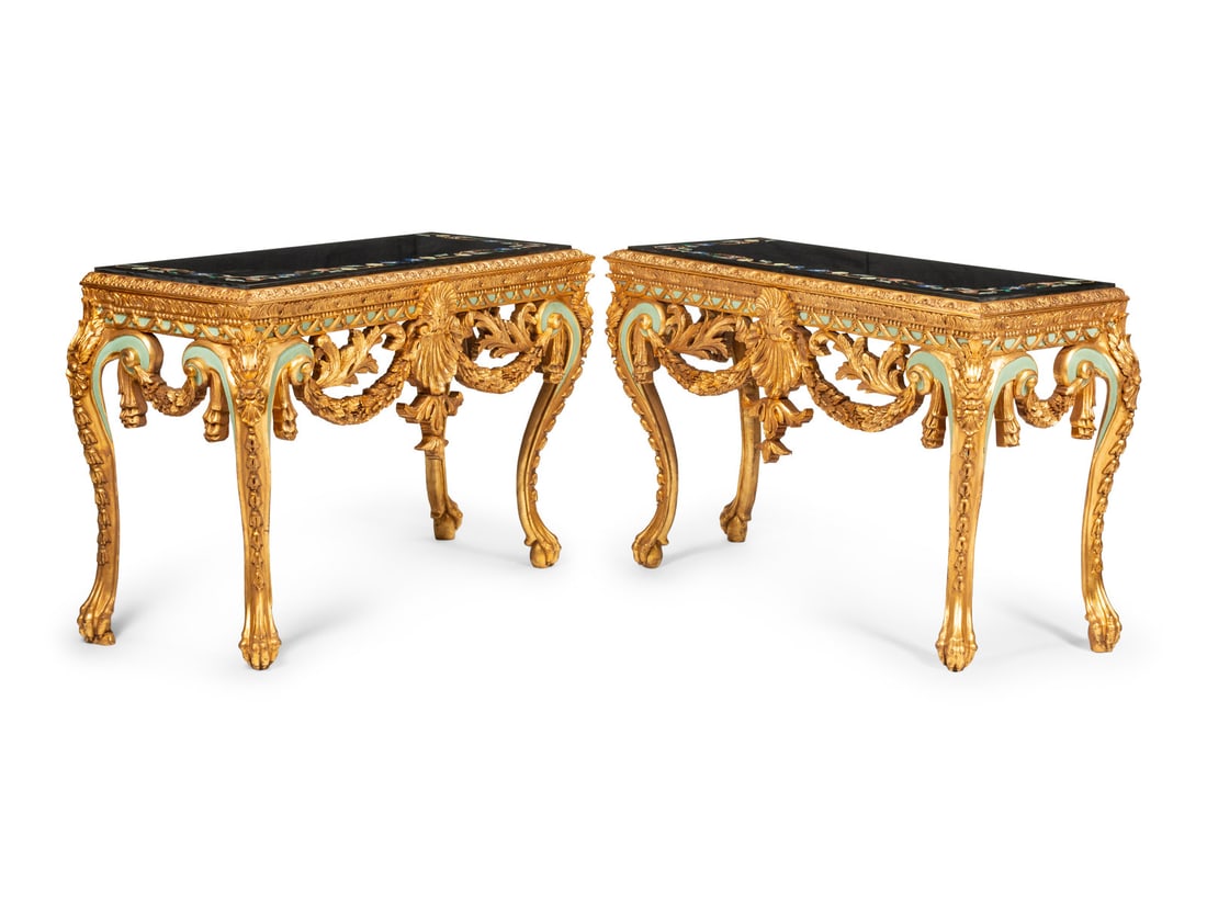 A Pair of Continental Giltwood Console Tables with Pietra Dura Tops: A Pair of Continental Giltwood Console Tables with Pietra Dura Tops 20th Century Height 34 x width 52 x depth 20 3/4 inches. This lot is located in Chicago.