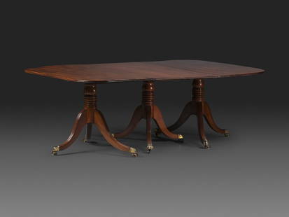 A Late Chippendale Flame Mahogany Triple Pedestal Dining Table: A Late Chippendale Flame Mahogany Triple Pedestal Dining Table Circa 1800 Height 28 1/4 x width 51 3/4 x length 79 1/4 inches. (overall) This lot is located in Cincinnati. Property from the Collection
