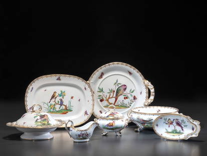 An English Parcel Gilt Bird and Insect Decorated Porcelain Partial Dinner Service: An English Parcel Gilt Bird and Insect Decorated Porcelain Partial Dinner Service 19th Century comprising: 2 tazze 2 round platters with handles 1 footed bowl 2 covered bowls 13 dinner plates 1