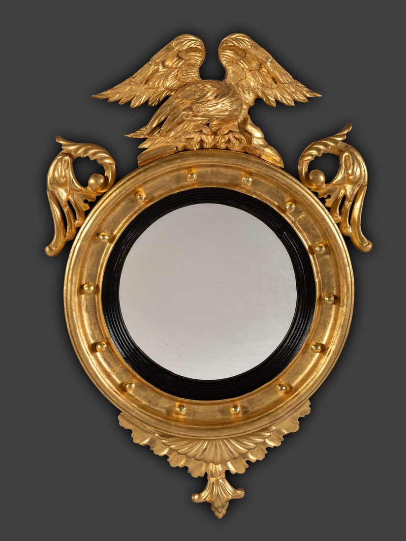 A Pair of Federal Giltwood Bull's Eye Looking Glasses: A Pair of Federal Giltwood Bull's Eye Looking Glasses 19th Century 37 x 23 inches (each). This lot is located in Cincinnati.