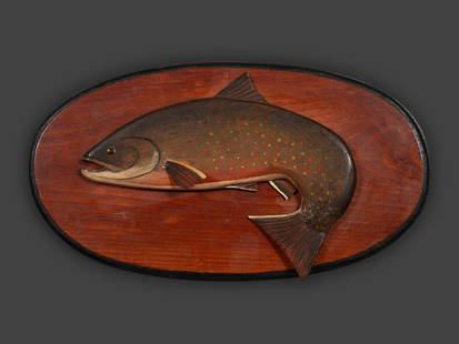 Three Paint Decorated Fish Decoys and Trophies: Three Paint Decorated Fish Decoys and Trophies 20th Century comprising two metal and carved wood decoys and one carved wood example, mounted as a trophy. Overall length of trophy 18 inches; length of