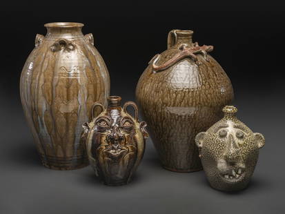 Four Southern Stoneware Jugs: Four Southern Stoneware Jugs North Carolina, 20th Century including three alkaline glaze jugs by Kim Ellington and a face jug by David Garner of Turn and Burn Pottery. shortest Ellington jug with inci