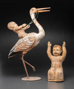 A Folk Art Carved and Painted Wood Figural Group of a Stork and Two Babies: A Folk Art Carved and Painted Wood Figural Group of a Stork and Two Babies Possibly French, Circa 1910 group originally consisted of this stork and four babies, two of which are purportedly now in ano