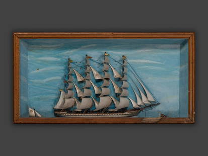 A Carved and Painted Wood Ship Diorama: A Carved and Painted Wood Ship Diorama Circa 1925 depicting the ship Silver Cloud, with two smaller vessels in the foreground. housed in a shadowbox frame. 19 1/8 x width 37 5/8 inches. This lot is lo