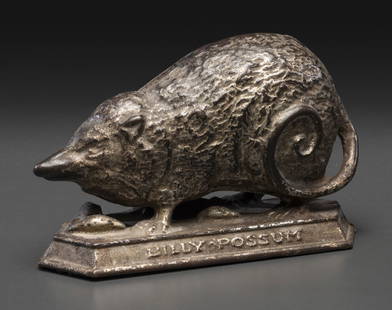 A 'Billy Possum' Cast Iron Still Bank: A 'Billy Possum' Cast Iron Still Bank American, circa 1909 the base reading Billy Possum to one side and Possum & Taters to the opposite side. the underside of base marked Copyrighted 1909 by Harper.