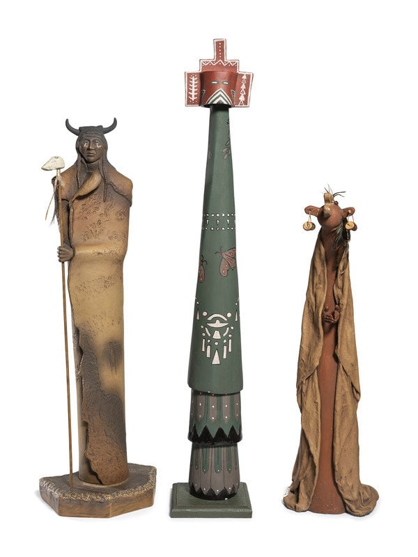 Southwestern-style Plaster Decorative Figures: Southwestern-style Plaster Decorative Figures late 20th century lot of 3, includes:a male figure wrapped in a buffalo robeheight 27-3/8 inchesa tall arched mudhead figure<