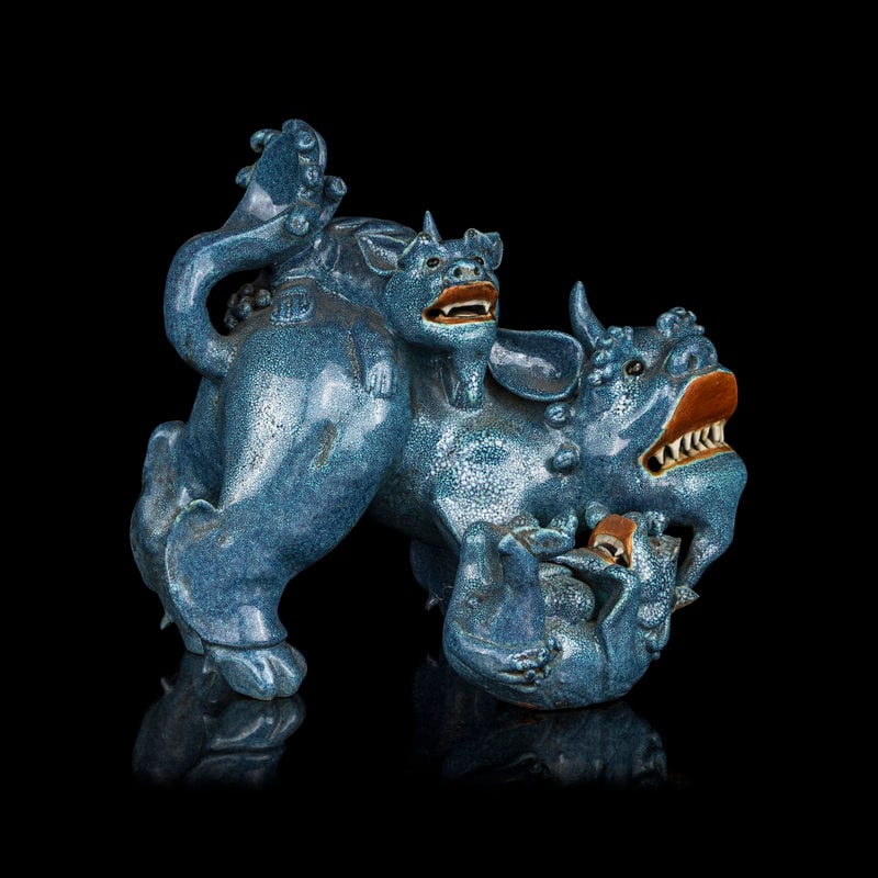 A Chinese Robin's Egg Glazed Porcelain Figural Group of Fu Lions (1 of 4)