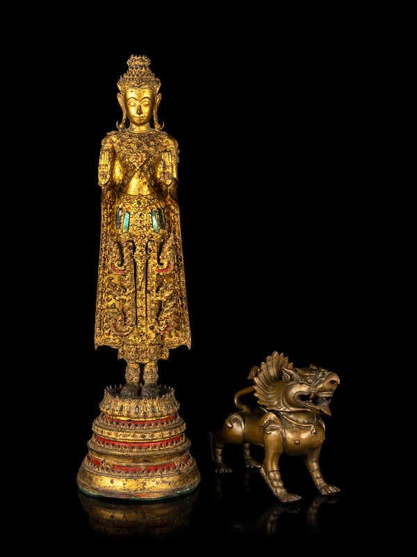 A Thai Gilt Bronze Figure of Standing Buddha and a Southeast Asian Bronze Figure of a Mythical Beast (1 of 4)