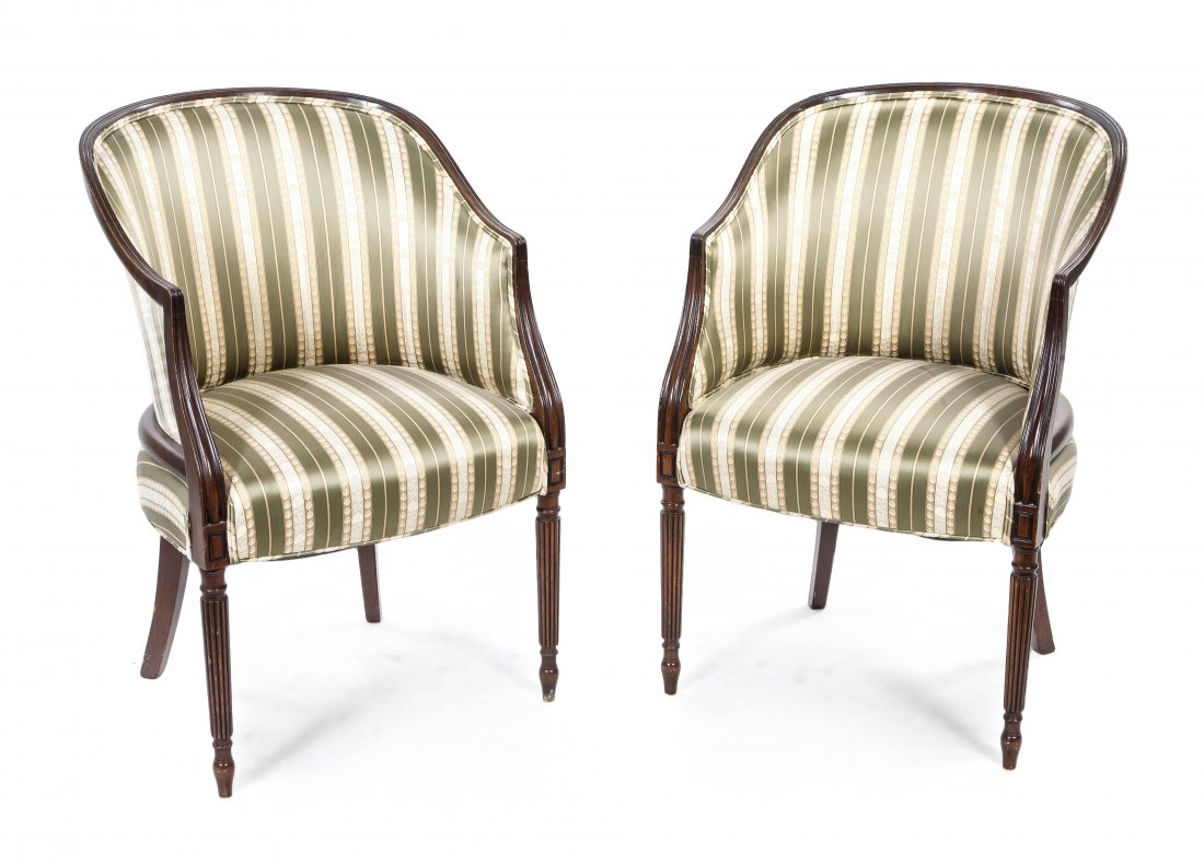 A Pair of Louis XVI Style Bergeres, Height 34 1/4: A Pair of Louis XVI Style Bergeres, having an upholstered barrel back and seat over the front tapering reeded legs. Height 34 1/4 inches. Property from the Collection of Jill Sherman Meyer, Highland P