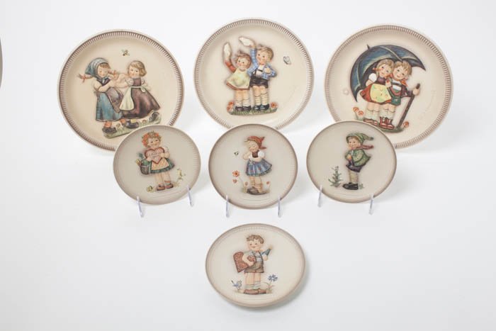 A Collection of Hummel and Hummel-Related Annual: A Collection of Hummel and Hummel-Related Annual Collector's Plates, comprising 69 examples of various years and sizes, together with 6 decorative baking molds; 75 items total, including 43 with origi