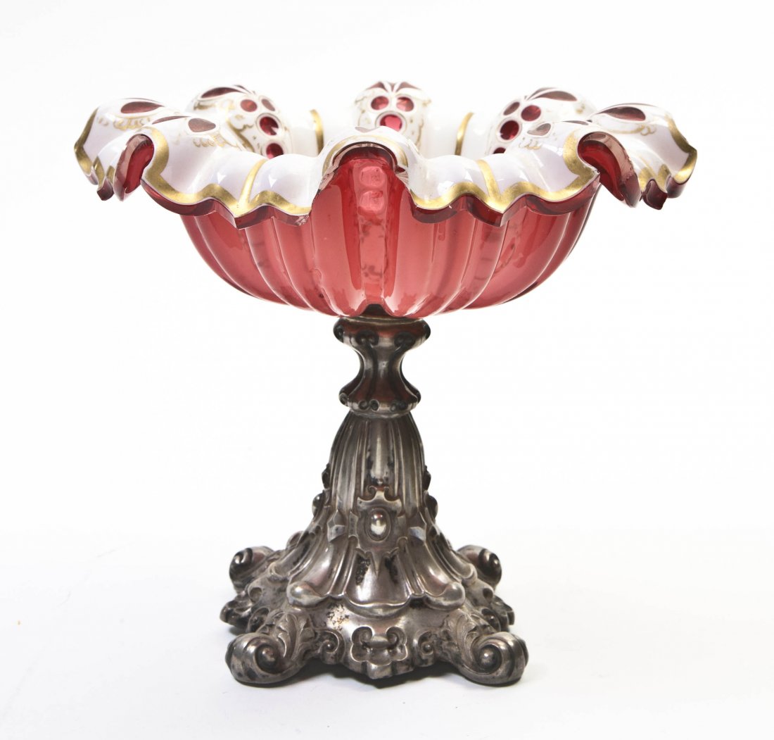 A Bohemian Glass and Silver Compote, Height of fi: A Bohemian Glass and Silver Compote, together with a red cut to clear example. Height of first 7 inches. Property from the Estate of Helen and Joseph L. Breger, Highland Park, Illinois