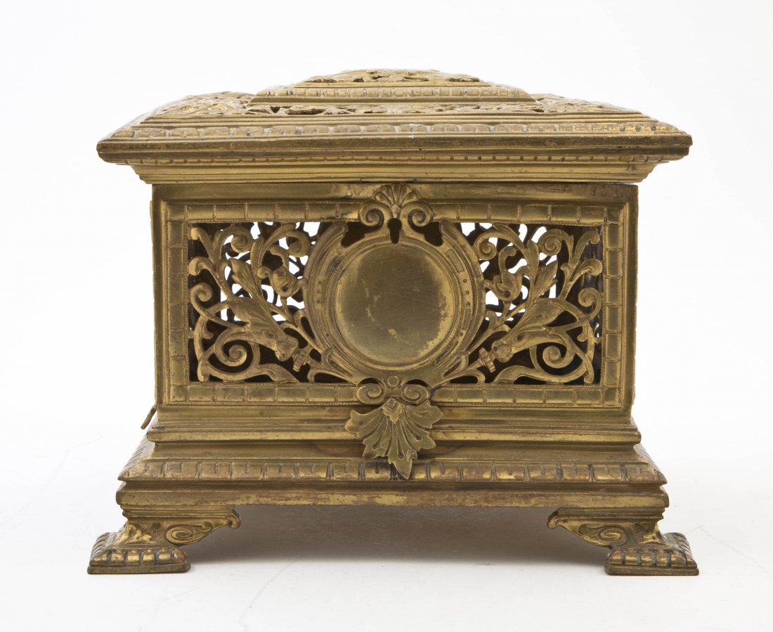 A Neoclassical Gilt Bronze Table Casket, Height 6: A Neoclassical Gilt Bronze Table Casket, of square form with pierced decoration. Height 6 1/8 inches. Property from the Estate of Beverly Blettner, Chicago, Illinois