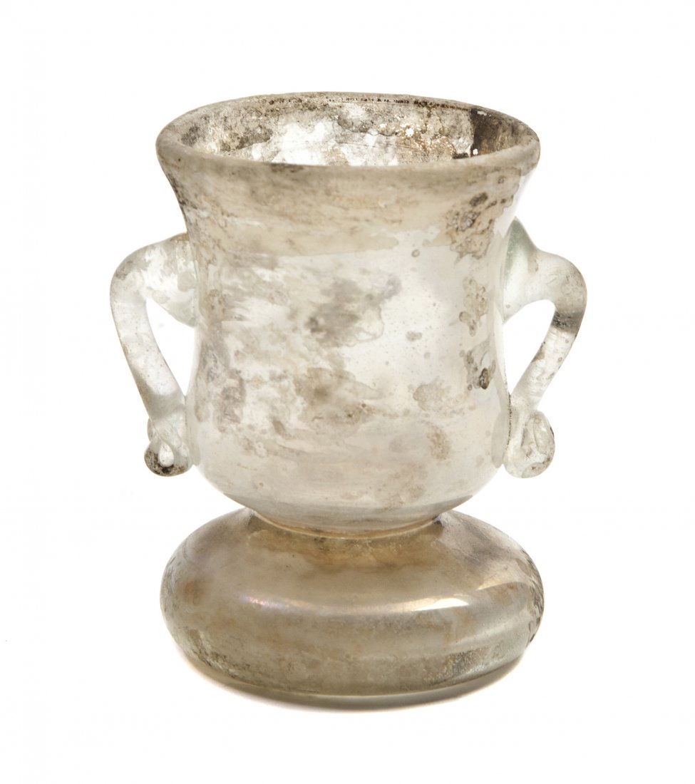 A Roman Glass Vessel, Height 3 inches.: A Roman Glass Vessel, of baluster form with applied handles. Height 3 inches. Property from the Estate of Jane Z. Plimpton, Chicago, Illinois