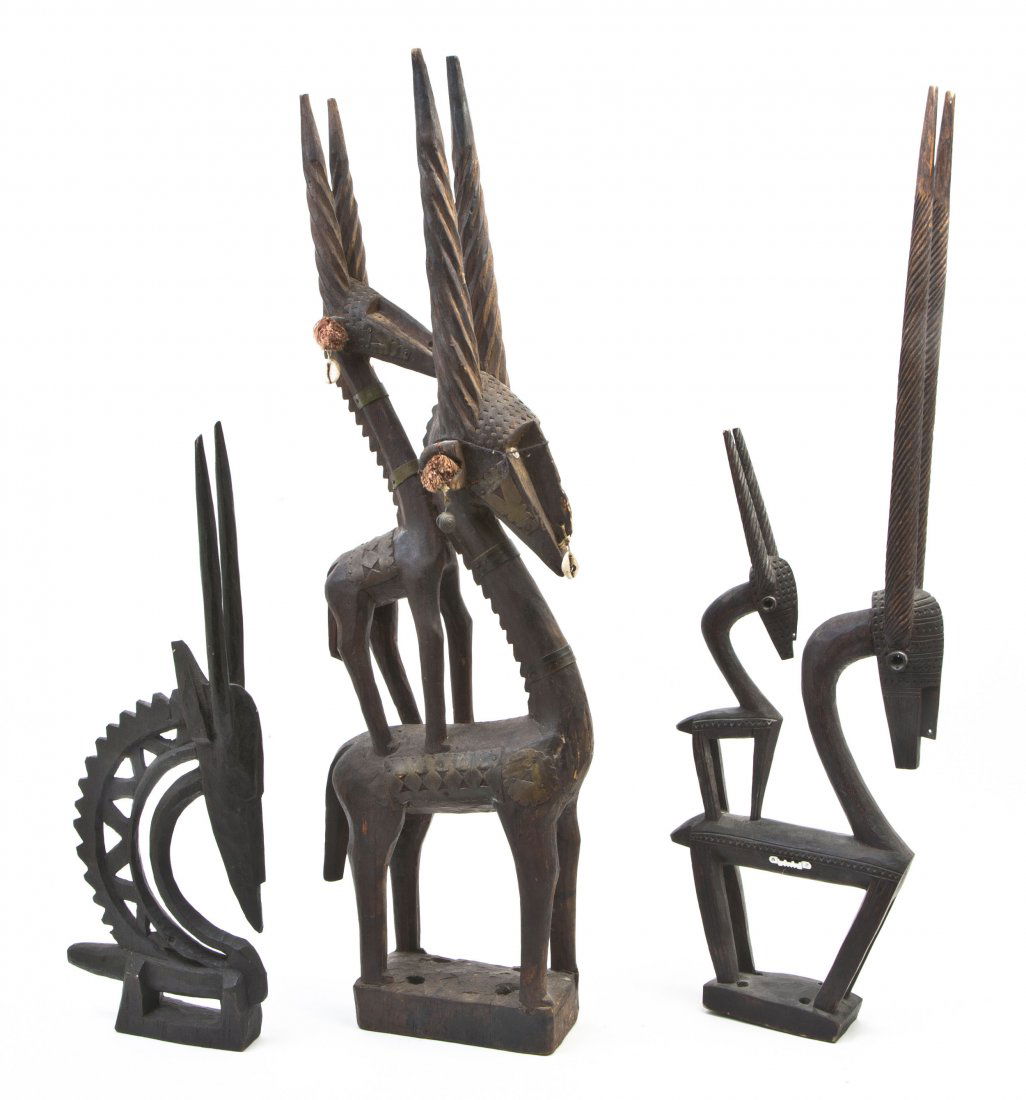 Three Carved Wood Chi Wara Masks, Height of talle: Three Carved Wood Chi Wara Masks, in the form of stylized antelopes. Height of tallest 35 inches. Property from the Estate of Edward F. Donohue, Grosse Pointe, Michigan