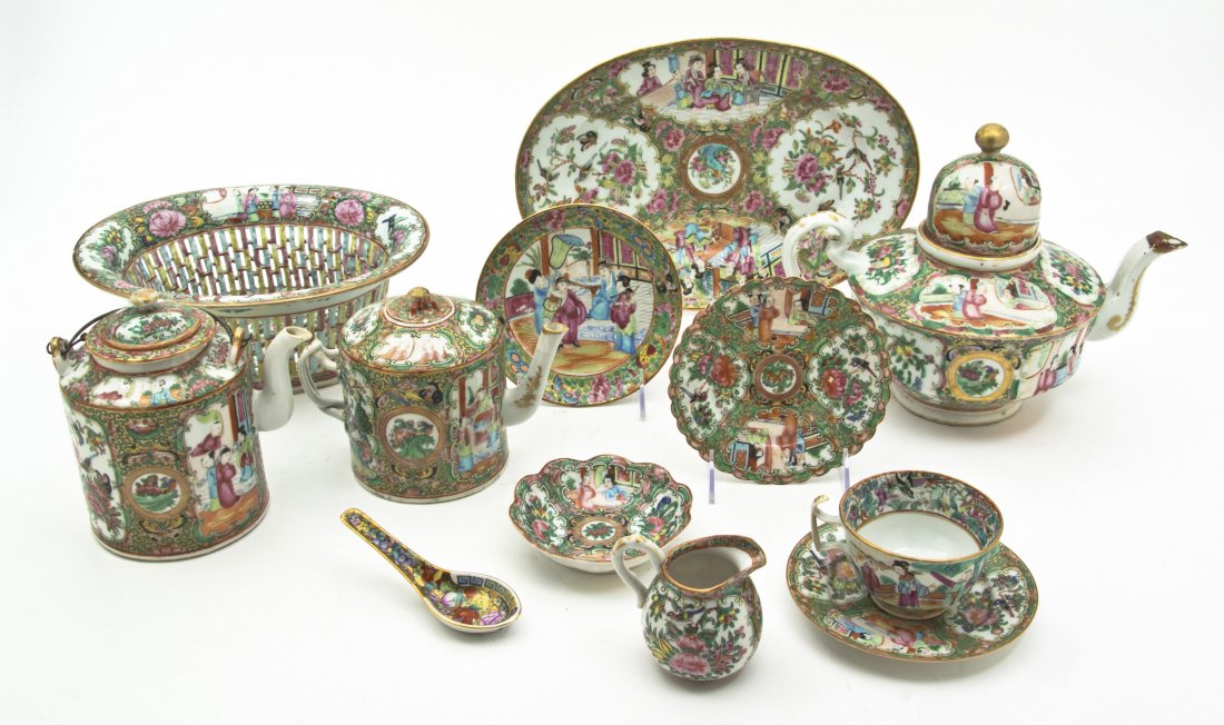 An Assembled Collection of Rose Medallion Porcela: An Assembled Collection of Rose Medallion Porcelain Articles, comprising 3 teapots, 15 saucers, 2 cups, a spoon, a creamer, a tray and a casket. Height of tallest 9 inches. Property from the Lucie Sab