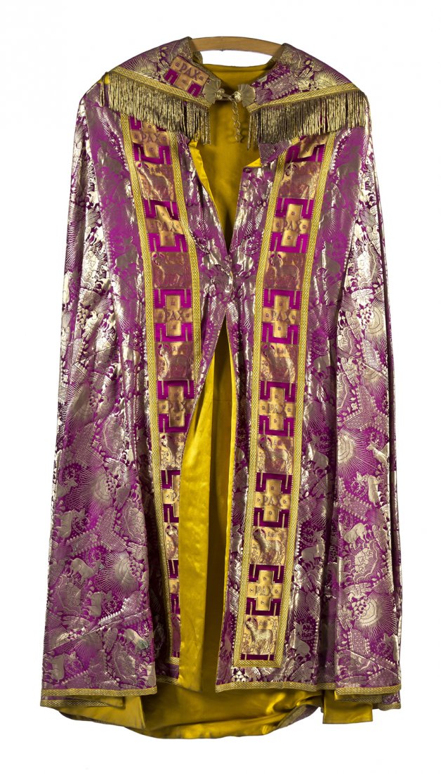 An Ecclesiastical Embroidered Cope and Sash, Leng: An Ecclesiastical Embroidered Cope and Sash, the reverse depicting Christ with a Latin inscription and a braided tassel, the front with embroidered scrolls and applied thuribles issuing smoke, having 