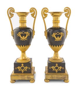 A Pair of Louis Philippe Gilt and Patinated Bronze Urns: A Pair of Louis Philippe Gilt and Patinated Bronze Urns Second Quarter 19th Century Height 15 3/4 inches. This lot is located in Chicago. Property from the Estate of Ward Gerard Gosselin, Batavia, IL