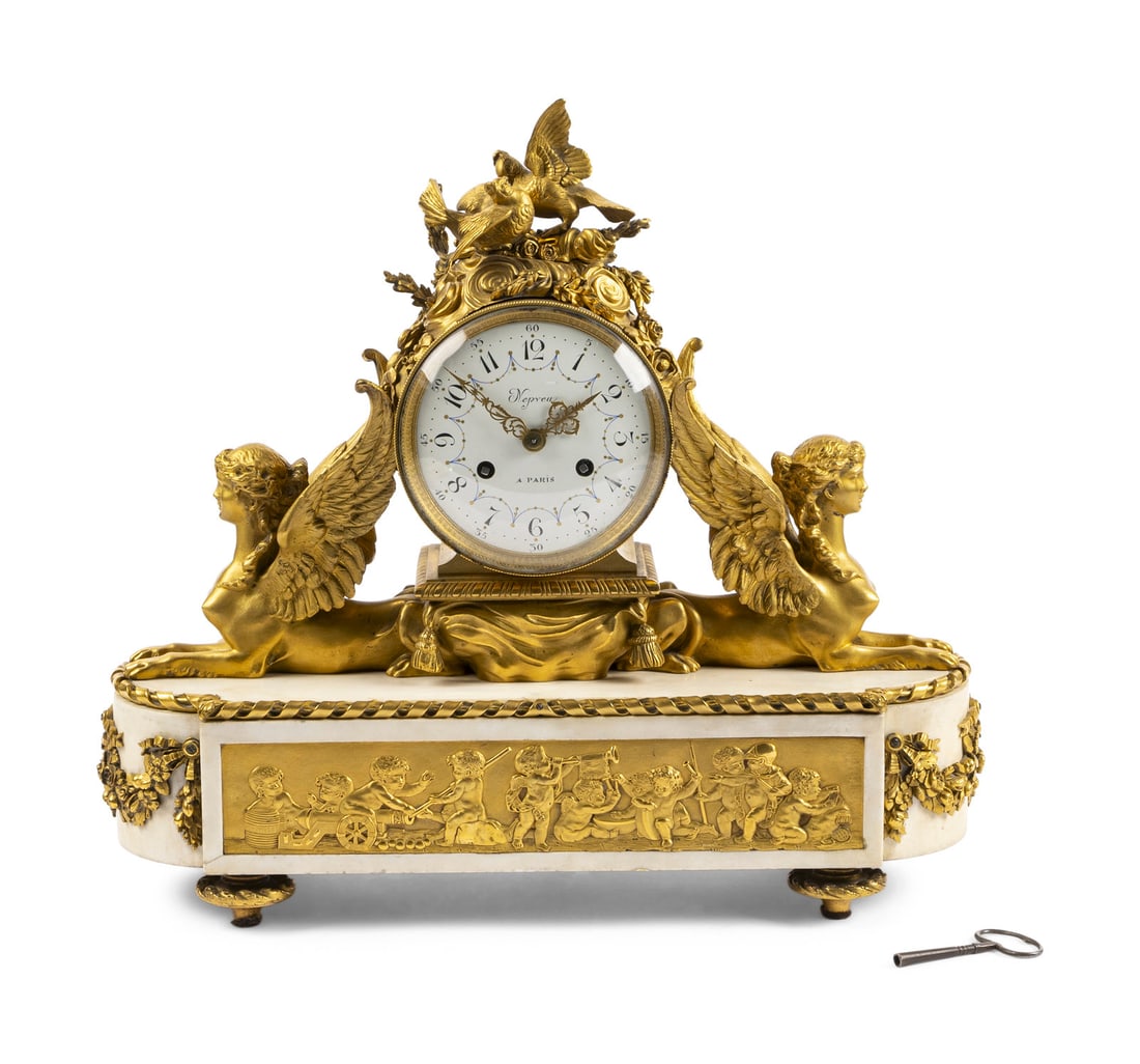An Empire Gilt Bronze and Marble Mantel Clock (1 of 6)