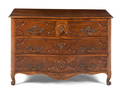 A Louis XV Provincial Walnut Commode: A Louis XV Provincial Walnut Commode 18th Century Height 32 1/2 x width 48 x depth 25 inches. This lot is located in Chicago.