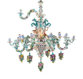 A Meissen Porcelain Twenty-Four Light Chandelier: A Meissen Porcelain Twenty-Four Light Chandelier 19th Century bearing crossed swords mark in underglaze blue to the central column; electrified. Height 38 inches x diameter 36 inches. This lot is loca