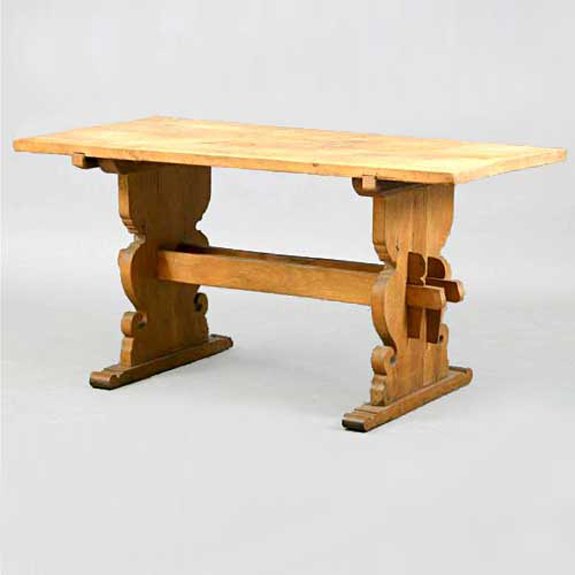 A Scandinavian Baroque Style Oak Trestle Table, He: A Scandinavian Baroque Style Oak Trestle Table, circa 1920, having a rectangular plank top and raised on shaped ends held by two stretchers with pegged tenons. Height 30 x width 60 x depth 28 inches.