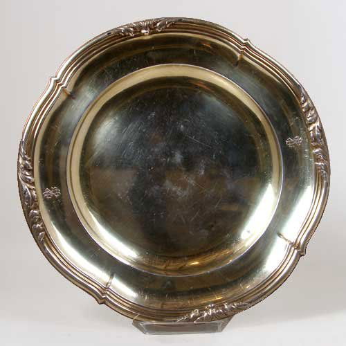 A French Gilt Silver Round Platter, Gustave Keller: A French Gilt Silver Round Platter, Gustave Keller, circa 1900, traditionally crafted in sterling silver with a vermeil wash with a triple reeded, shaped edge with foliate details and two opposing own