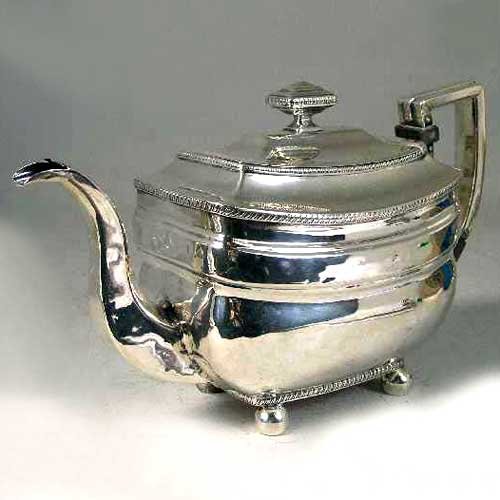An American New York William Thomson Federal Coin : An American New York William Thomson Federal Coin Silver Teapot, circa 1805, having gadroon edges and a molded girdle, raised on ball feet; stamped W. Thomson, total weighable 26.4 ozt. Height 6 1/2 x