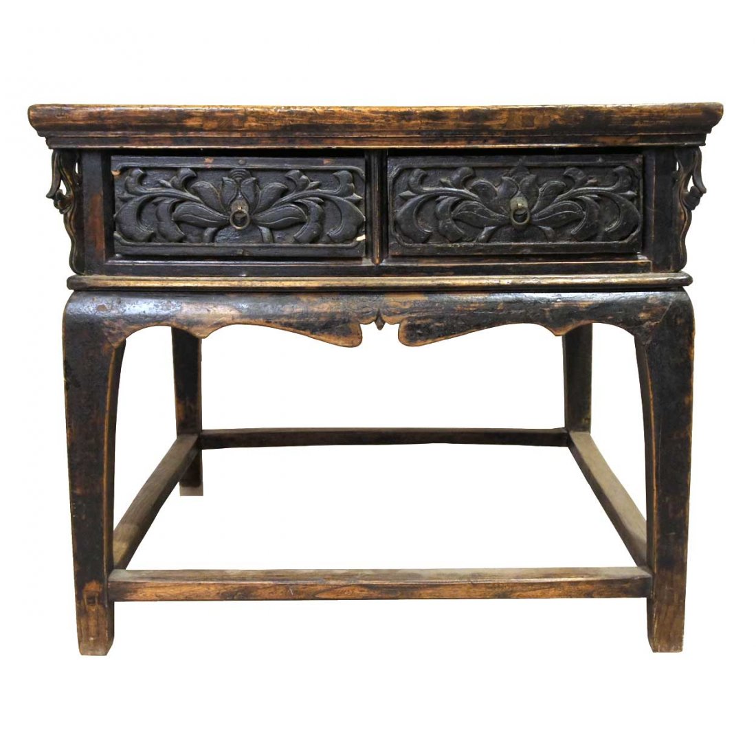 A Chinese Shanxi Black Lacquer Elm Corner-Leg Squa: A Chinese Shanxi Black Lacquer Elm Corner-Leg Square Table, circa 1750, having a floating panel top over a deep apron with two carved floral panels and two small drawers, atop four square legs that su
