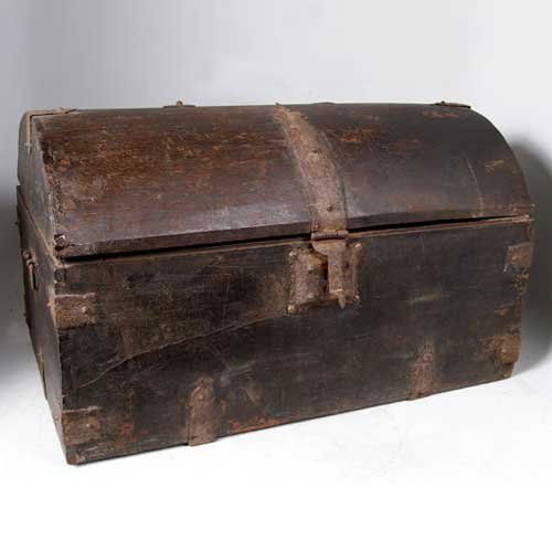 An Indian Teak Dome Top Box, Height 14 1/2 x width: An Indian Teak Dome Top Box, 18th century, having an arched top on a rectangular base with side handles; with hand forged iron, arrowhead hinges and straps, and the original iron lock. Height 14 1/2 x